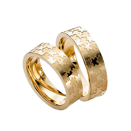 Trauringe mit Puzzle Optik in gelbgold